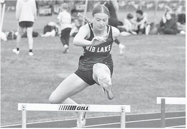 Tlusty repeats in high hurdles; Rademacher wins the high jump title