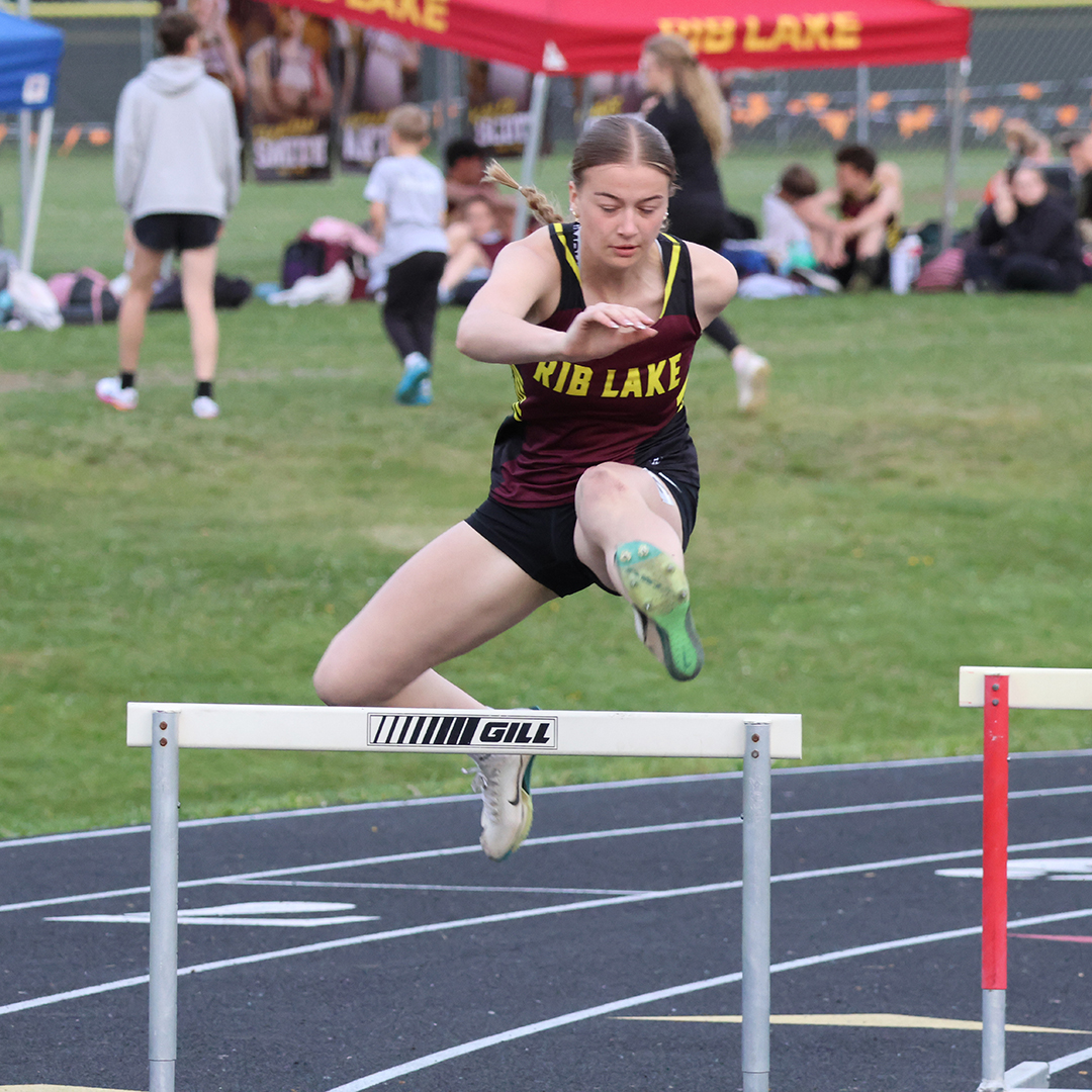 Tlusty repeats in high hurdles; Rademacher wins the high jump title