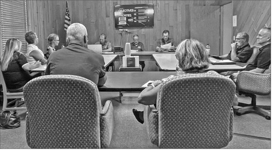 School board, village share budget woes