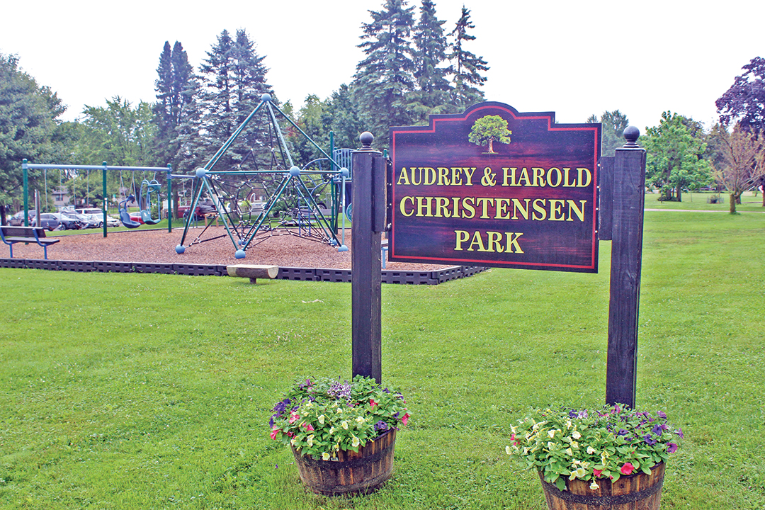 Abby OK’s new sidewalk at Christensen Park