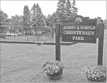 Abby OK’s new sidewalk at Christensen Park