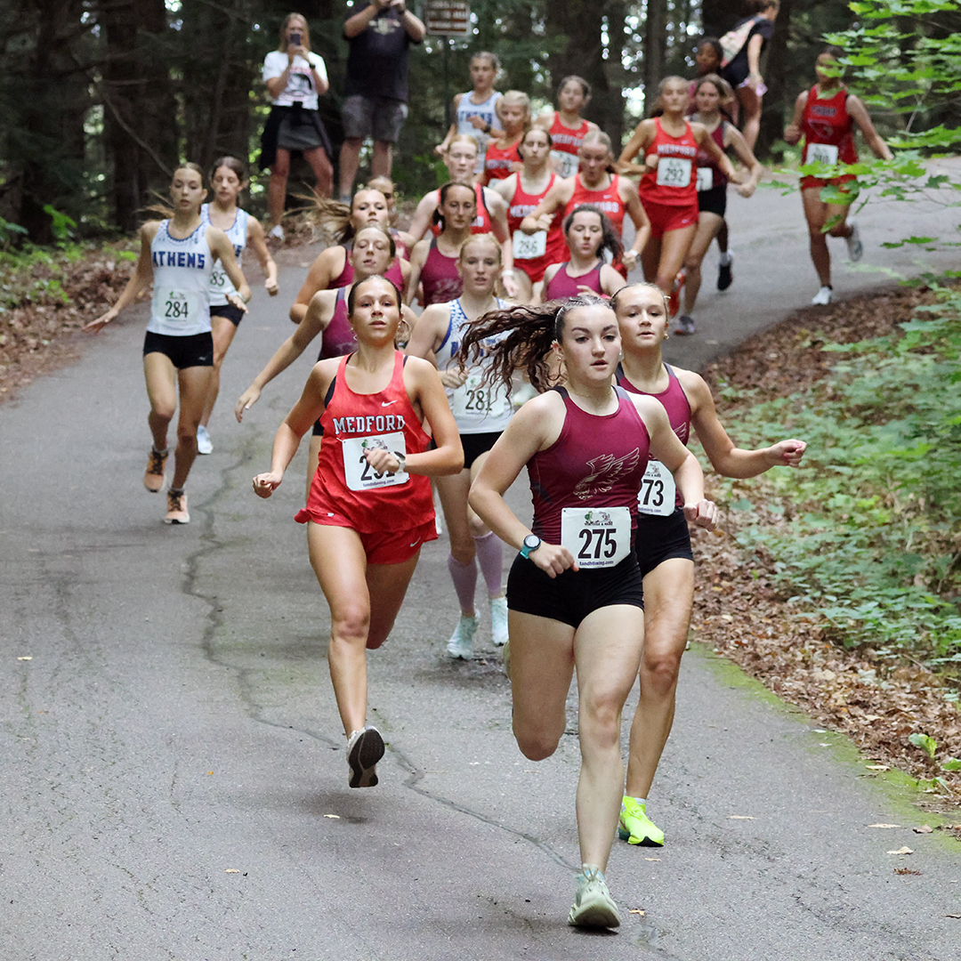 HAWKS OWN THE HILL Hosts sweep opening meet, Raiders 2nd in both