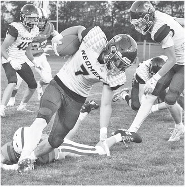 Game swings on key plays early, then Thorp wears down Redmen