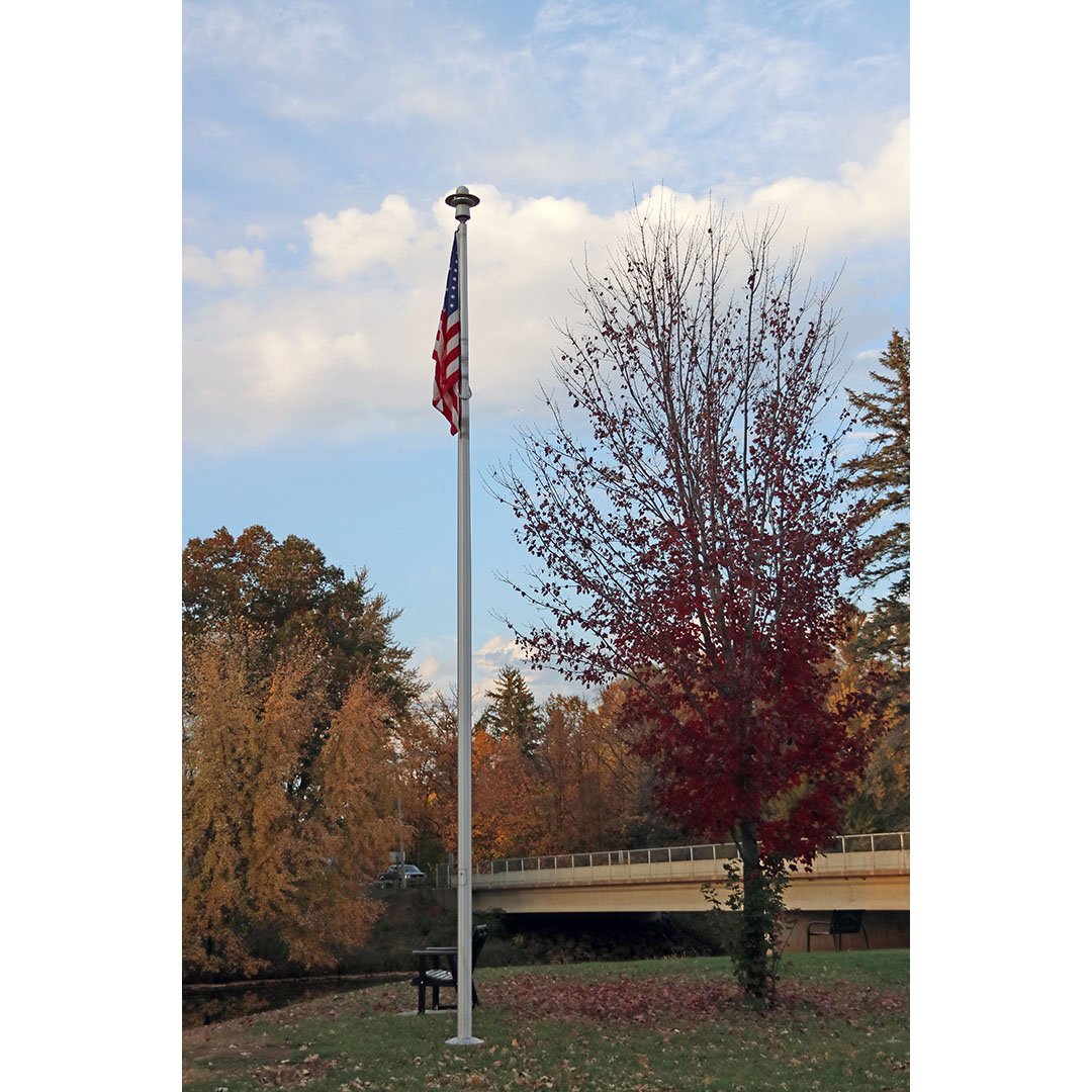 Flag pole by the river perfect for veterans tribute Flag pole by the river perfect for veterans tribute